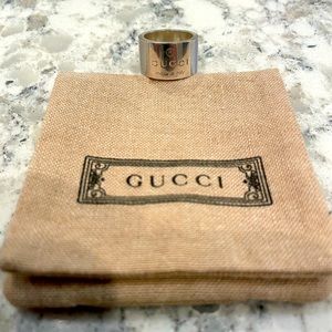 Gucci Sterling silver wide band logo ring with original box & dust cover.